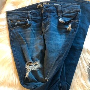 Distressed boot cut Jeans
